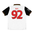 White sports jersey with red '92' and 'EST.' text 